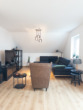 Wohnzimmer - Schicke 3-Zimmer-Wohnung mit Einbauküche, Balkon, Garage und Stellplatz
