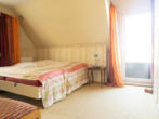 Schlafzimmer im DG - Gemütliche DHH nahe dem Stadzentrum mit Doppelgarage und Garten