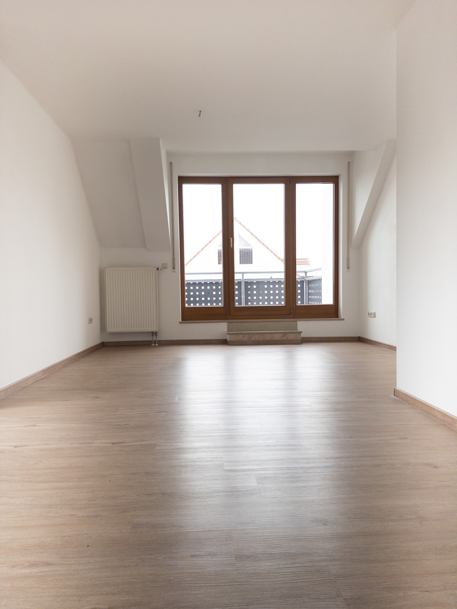 Wohnzimmer  1.2 mit Blick zur Loggia