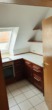Küche - Dachgeschosswohnung mit Einbauküche und Balkon