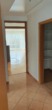 Gang - Dachgeschosswohnung mit Einbauküche und Balkon